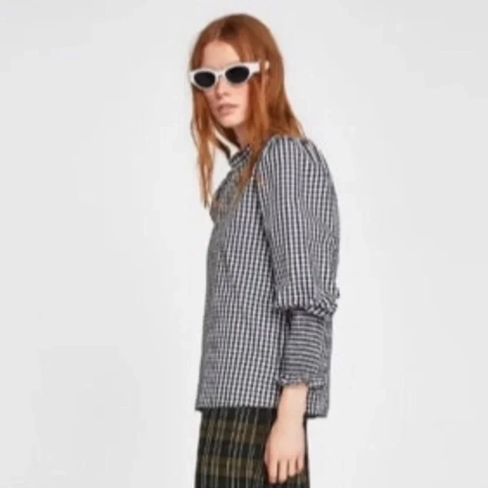 Zara Women’s Black and White Checkered Long Sleeves Blouse